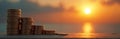 Stacks of coins decrease in size against bright sunset over water. Financial decline, economic hardship, fading wealth. Image Royalty Free Stock Photo