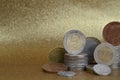 Stacks of coins from different nations with space Royalty Free Stock Photo