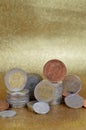 Stacks of coins from different nations with space Royalty Free Stock Photo