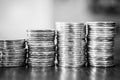 Stacks of coins showing growth in Black and White