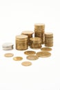 Stacks of coins on a white background.