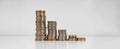 Stacks of coins on a white background