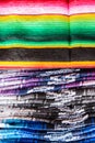 Stacks of colored blankets
