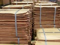 Stacks of copper sheets. Warehouse of finished products at the metallurgical plant. Royalty Free Stock Photo