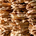 Stacks of crispy pita breads. Golden bread Crust, background or texture. Close-up shot. Soft focus. Square format Royalty Free Stock Photo
