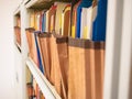 Stacks of document paper and files folder in a filing cabinet