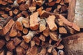 Stacks of dry textured firewood closeup. P