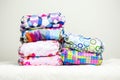 Stacks of eco friendly washable textile diapers. Royalty Free Stock Photo