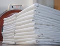 Stacks of folded white fabrics in a laundry Royalty Free Stock Photo