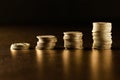 Stacks of coins dark background