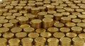 Stacks of golden coins arranged in neat rows on a flat surface. Each column is Royalty Free Stock Photo
