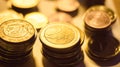 Stacks of golden euro coins on the table closeup Royalty Free Stock Photo