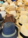 Stacks of men`s hats on the street market Royalty Free Stock Photo