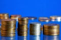 Stacks of metal coins accountant, financial and economic product. Coin-a money sign made of metal by coinage are in the form of a Royalty Free Stock Photo