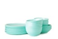Stacks of mint ceramic dishware isolated on white background Royalty Free Stock Photo