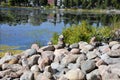 Relaxing, Zen Like View Including Stacks of Natural Rocks and a Lake during a Sunny Day