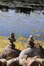 Relaxing, Zen Like View Including Stacks of Natural Rocks and a Lake during a Sunny Day Royalty Free Stock Photo