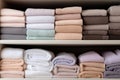 Stacks Of Neatly Folded Towels In Pristine Linen Closet. Generative AI