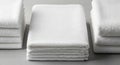 Stacks of neatly folded white towels Royalty Free Stock Photo