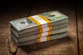 Stacks of new 100 US dollars 2013 banknotes Royalty Free Stock Photo