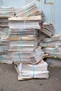 Stacks of Newpapers on urban street Royalty Free Stock Photo