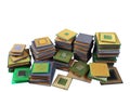 Stacks of old CPU chips and obsolete computer processors isolated on white background Royalty Free Stock Photo