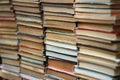 Stacks of old hardback and paperback books Royalty Free Stock Photo