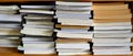 Stacks of old paperback books in the shelves Royalty Free Stock Photo