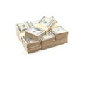 Stacks of One Hundred Dollar Bills Isolated on a White Background Royalty Free Stock Photo