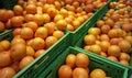 Stacks of orange exotic fruits