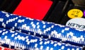Closeup of stacked poker chips in a case on the table Royalty Free Stock Photo