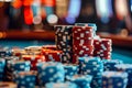 stacks of poker chips on a gaming table in casino, close up shot of piled up gambling chips, casino banner concept with