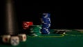 Stacks of poker chips on a green table in the casino Royalty Free Stock Photo