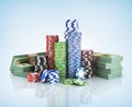 Stacks of poker chips with stack of dollars. Royalty Free Stock Photo