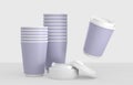 Stacks purple paper coffee cups and white plastic lids, packaging mockup. Blank to go beverage mug pile for take away