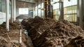 Stacks of Raw Peat in Industrial Plant Royalty Free Stock Photo