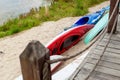 Stacks Of Rental Boats Canoes Wait On The Beach Royalty Free Stock Photo