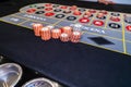 Stacks of roulette chips on table Royalty Free Stock Photo