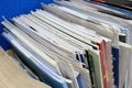 Stacks or rows of books, magazines, journals and newspapers in a library