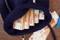 Stacks of russian rubles in open woman handbag Royalty Free Stock Photo