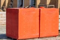 Stacks of silicate bricks on wooden pallets and in polyethylene