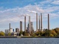 Stacks and silos of Circle K oil and gas terminal along Limfjord in Aalborg, Nordjylland, Denmark