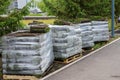 stacks of sod rolls for new lawn for landscaping. Lawn grass in rolls on pallets. rolled grass lawn is ready for laying Royalty Free Stock Photo