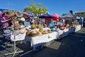 Stacks of straw hats on a Nelson market stall, Nelson, New Zealand