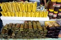 Stacks of Suman sa Ibos and Suman sa Lihiya and other local sweet delicacies sold at a souvenir shop