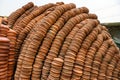 Stacks of Terracotta Pots Displayed Outdoors in an Artistic Arrangement Royalty Free Stock Photo