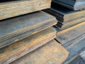 stacks of thick rusted flat metal sheets - close-up Royalty Free Stock Photo