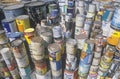 Stacks of toxic paint cans waiting for disposal at a Wilmington Unocal station in Los Angeles, CA Royalty Free Stock Photo