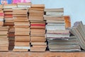 Stacks of used books and magazines for sale