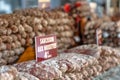 Stacks of various kinds of saucisson or saucisson sec - dry-cured sausages. Royalty Free Stock Photo